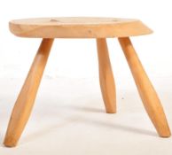 A RETRO VINTAGE MID 20TH CENTURY LIVING EDGE TABLE