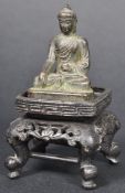 19TH CENTURY CHINESE MINIATURE BRONZE BUDDHA ON STAND
