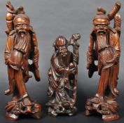 THREE CHINESE / ORIENTAL CARVED HARDWOOD ELDER / IMMORTAL FIGURES