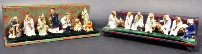 TWO MID 20TH CENTURY CASED POTTERY ELDERS / MUD MEN FIGURES