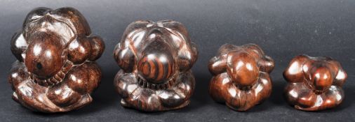 GRADUATING SET OF CHINESE CARVED WEEPING BUDDHAS