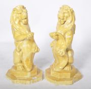 20TH CENTURY MATCHING PAIR OF POTTERY GARDEN LION FIGURES