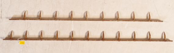 A PAIR OF FRENCH METAL BUTCHER'S HOOKS