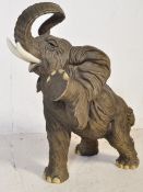 VINTAGE 20TH CENTURY RESIN CAST FIGURINE OF AN ELEPHANT