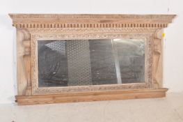 A VICTORIAN 19TH CENTURY OVERMANTEL PINE CARVED MIRROR