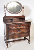 1930S JACOBEAN REVIVAL OAK MIRROR BACK CHEST ON DRAWERS
