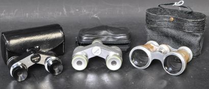 THREE PAIRS OF EARLY 20TH CENTURY BINOCULARS