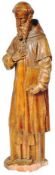 17TH CENTURY CONTINENTAL LIMESTONE FIGURE OF ST ANTONY