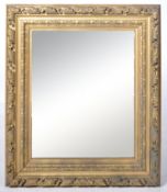 19TH CENTURY GEORGE III CARVED OAK HANGING MIRROR