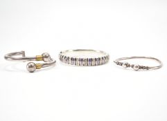 ASSORTMENT OF SILVER BANGLES