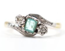 18CT GOLD & PLATINUM EMERALD & DIAMOND CROSSOVER RING