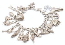 SILVER & WHITE METAL CHARM BRACELET