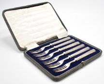 1920S SILVER HANDLED DESSERT FORKS