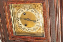 EARLY 20TH CENTURY PLEASANCE AND HARPER OAK GRANDDAUGHTER CLOCK