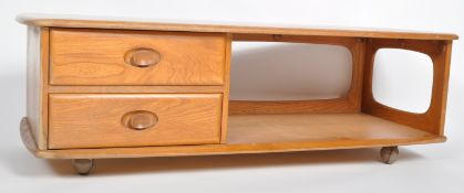 ERCOL - MINERVA - 1970s ELM COFFEE TABLE RAISED ON CASTORS