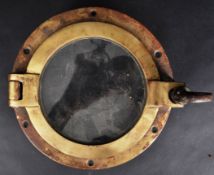 20TH CENTURY BRASS FRAMED NAUTICAL SHIP'S WINDOW
