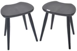 ERCOL - MODEL 425 - PAIR OF EBONISED SADDLE STOOLS