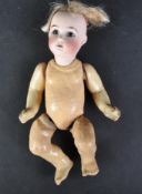 EARLY 20TH CENTURY FRENCH LIMOGE PORCELAIN HEADED DOLL