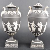 PAIR OF 19TH CENTURY WEDGWOOD BLACK JASPERWARE URNS