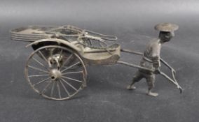 EARLY 20TH CENTURY CHINESE BRASS CRUET STAND