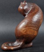 CONTEMPORARY CARVED STAINED WALNUT SCULPTURE
