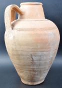 20TH CENTURY ROMAN STYLE TERRACOTTA TWIN HANDLE VESSEL