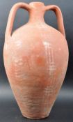 20TH CENTURY ROMAN STYLE TERRACOTTA TWIN HANDLE VESSEL