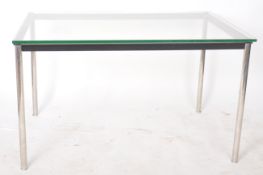 MANNER OF LE CORBUSIER - LC10 - CHROME AND GLASS DINING TABLE