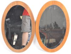 MATCHING PAIR OF MID CENTURY TEAK FRAMED MIRRORS