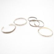 GROUP OF SILVER BANGLE BRACELETS