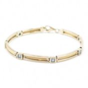 18C GOLD & AQUAMARINE LINE BRACELET