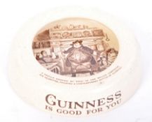 A VINTAGE POTTERY GUINNESS PUB ASH TRAY