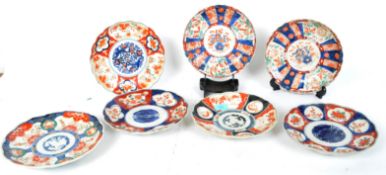 A COLLECTION OF SEVEN IMARI PROCELAIN PLATES