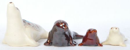 FOUR VINTAGE FOSTERS CORNISH POTTERY SEAL ORNAMENTS