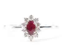 PLATINUM RUBY & DIAMOND HALO RING