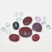 SIX ANTIQUE COLOURED GLASS INTAGLIOS