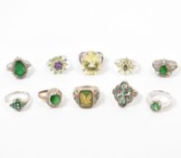 GROUP OF 925 SILVER GREEN STONE SET RINGS