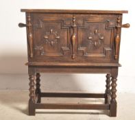 1920S JACOBEAN REVIVAL OAK WINE COOLER