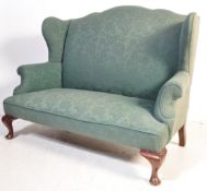 LATE 19TH CENTURY UPHOLSTERED TWO SEATER SOFA