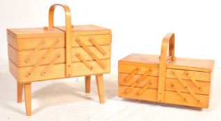A PAIR OF CANTILEVER TEAK WOOD SEWING BOXES