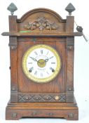 FATTORINI & SONS OAK CASED MANTEL CLOCK