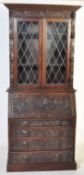 VICTORIAN DARK CARVED OAK BUREAU BOOKCASE
