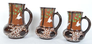 AFTER CHRISTOPHER DRESSER - THREE MATCHING JUGS