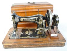 EARLY 20TH CENTURY FRISTER & ROSSMANN SEWING MACHINE IN CASE