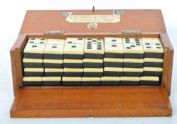 EARLY 20TH CENTURY CIRCA 1920S BAKELITE BOXED DOMINO SET
