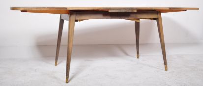 A MID 20TH CENTURY EBONISED TEAK & LAMINATE ITALIAN DINING TABLE