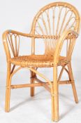 A RETRO MID 20TH CENTURY BAMBOO & RATTAN GARDEN ARMCHAIR