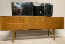 A RETRO MID 20TH CENTURY TEAK WOOD DRESSING TABLE