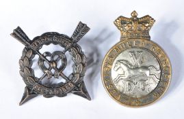 TWO LATE 19TH CENTURY BRITISH MILITARY CAP BADGES