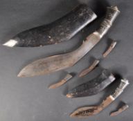 TWO EARLY 20TH CENTURY GURKHA KUKRI KNIVES IN SCABBARDS